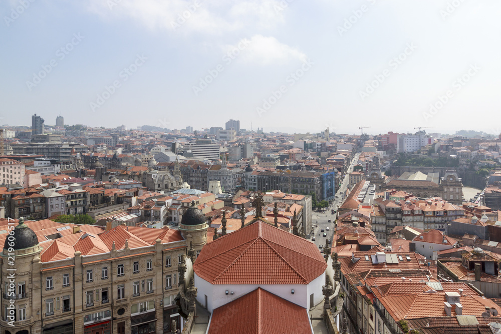 Porto, Portugal – May 20, 2018. Scenic view of the town from the tower Clérigos Church. Orange roofs of the houses.