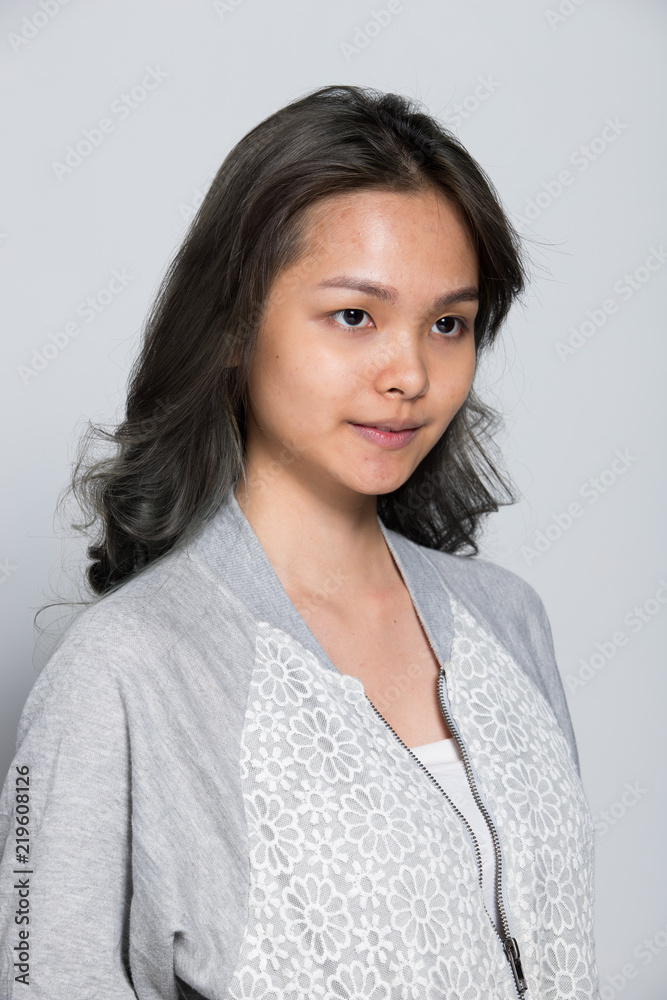 Asian Woman before make up hair style. no retouch, fresh face Asian Woman before make up hair style. no retouch, fresh face