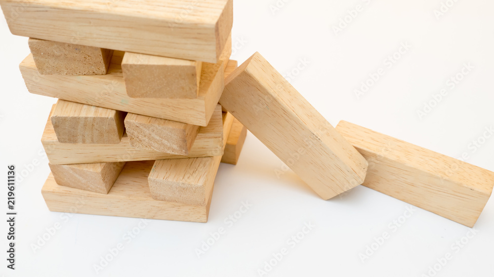 Falling tower close up on white background Falling tower close up on white background