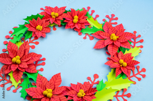 Christmas wreath of paper flowers poinsettia