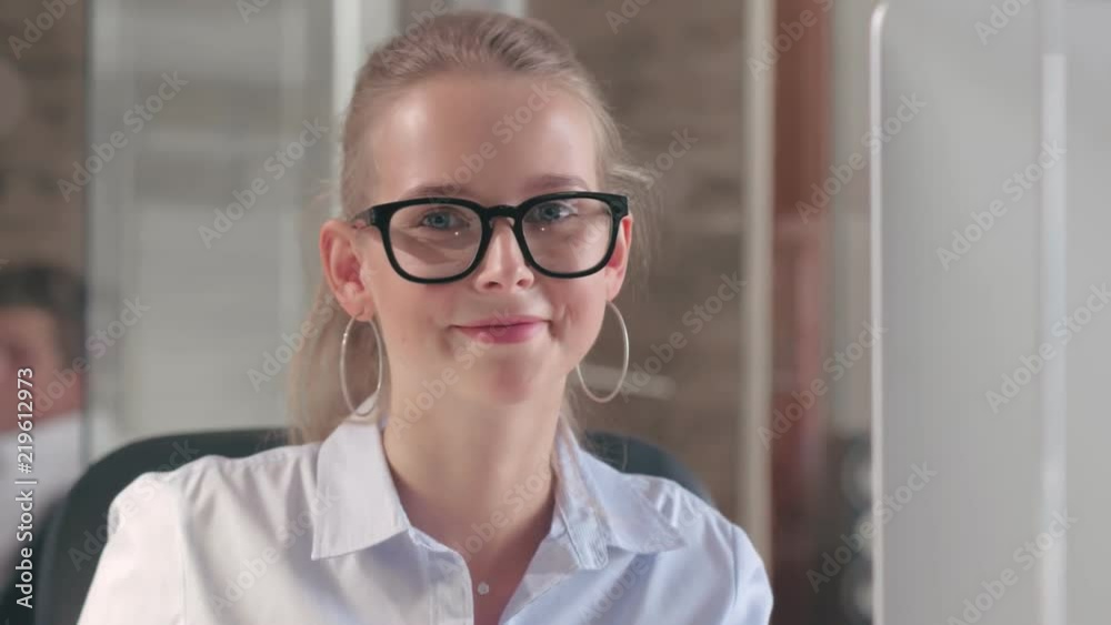 Office worker successfully working at computer Office worker successfully working at computer