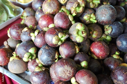 Vietnamese purple mangosteen. This seasonal fruit usually has during summer time in South of Vietnam. It has white flesh and seed. The purple cover give bring tart taste while the flesh is sweet.