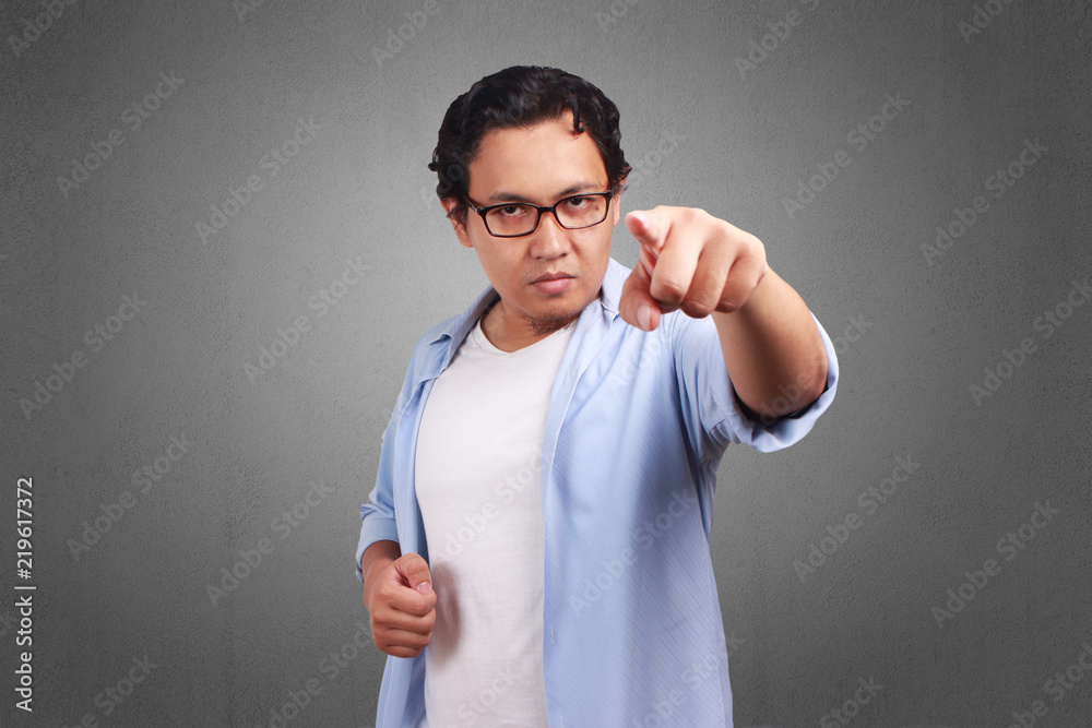 Young Man Appointing, Angry Expression Young Man Appointing, Angry Expression