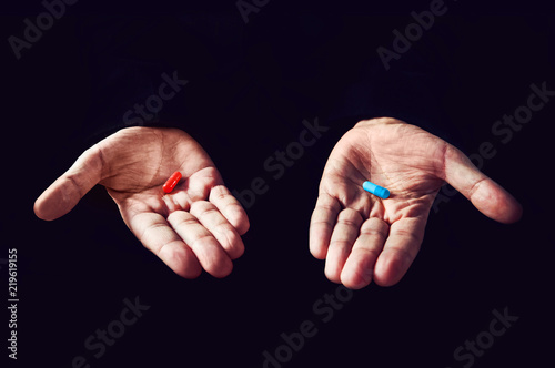 Red Pill Blue Pill concept. The right choice the concept of the movie matrix. The choice of tablets photo