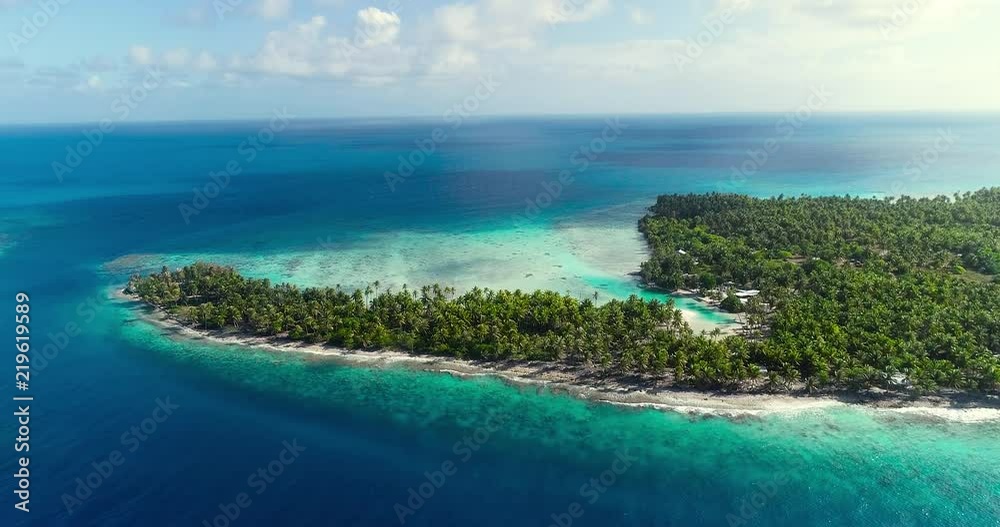small islands (motu) in the middle of a lagoon in aerial view, French Polynesia small islands (motu) in the middle of a lagoon in aerial view, French Polynesia