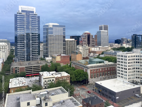 Looking out at downtown Portland, Oregon from a high rise building.