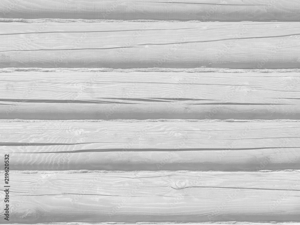 Old cracked weathered white wooden log wall texture background material design. Old cracked weathered white wooden log wall texture background material design.
