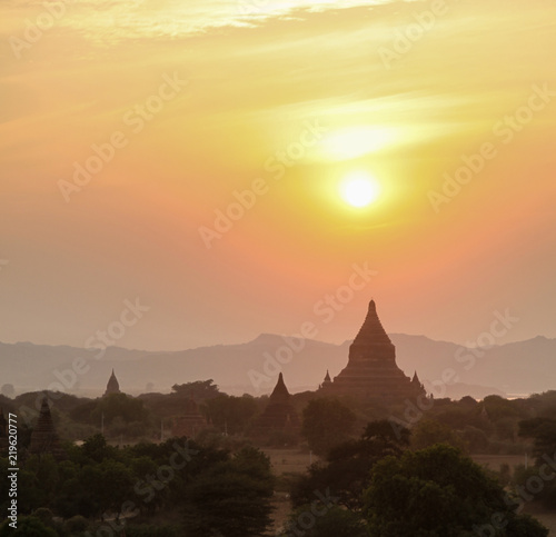 Sunset across the temples in Bagan Myanmar Asia. This ancient city is home to thousands of temples © jeayesy