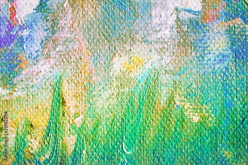 Grunge colorful green blue and yellow background with brush strokes. Oil painting on canvas. Scratched wall texture. Fragment of artwork.