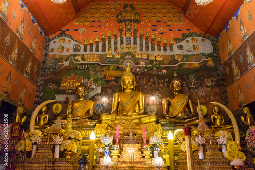 traditional buddha statues decoration in thai chapel © Arissara