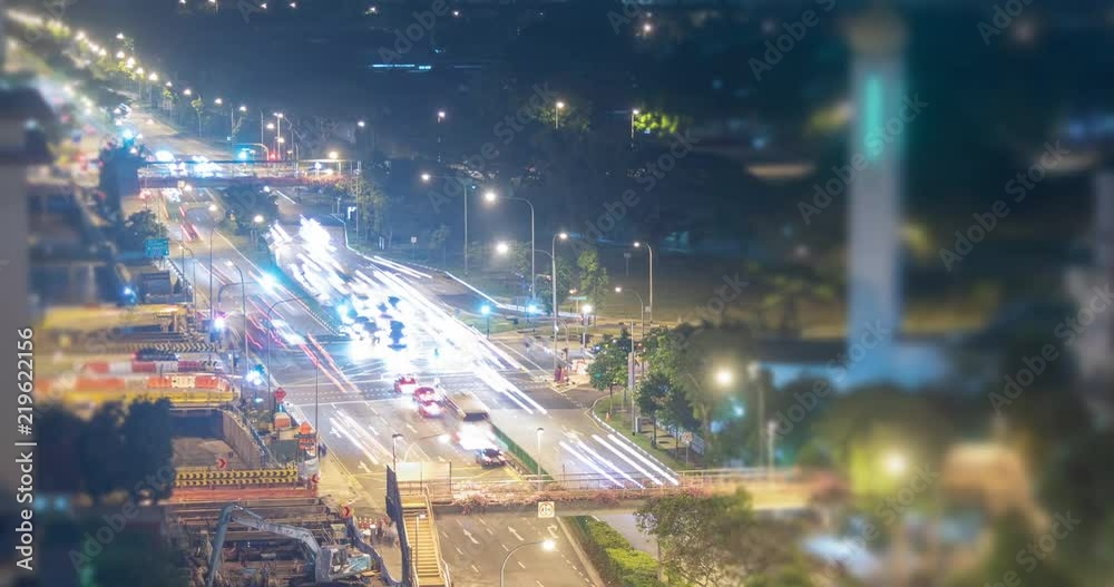 Traffic signal cars stopping and moving timelapse video clip at night, Singapore Traffic signal cars stopping and moving timelapse video clip at night, Singapore