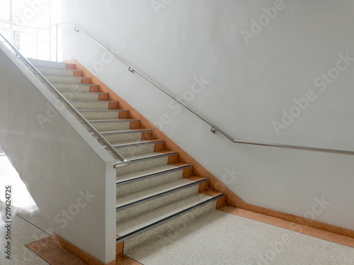 Concrete ladder with handrail