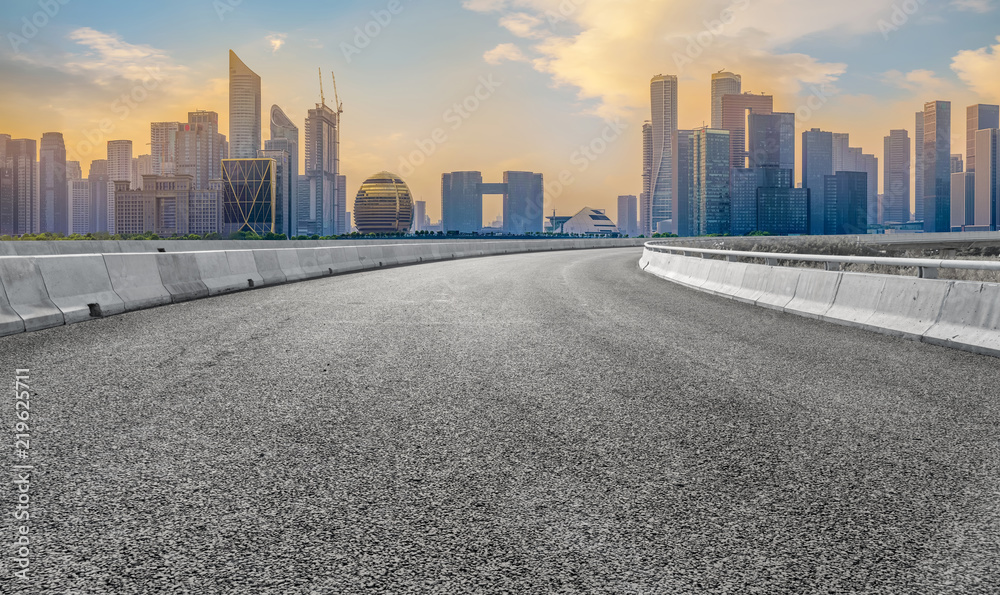 Urban road asphalt pavement and skyline of Hangzhou architectural landscape Urban road asphalt pavement and skyline of Hangzhou architectural landscape