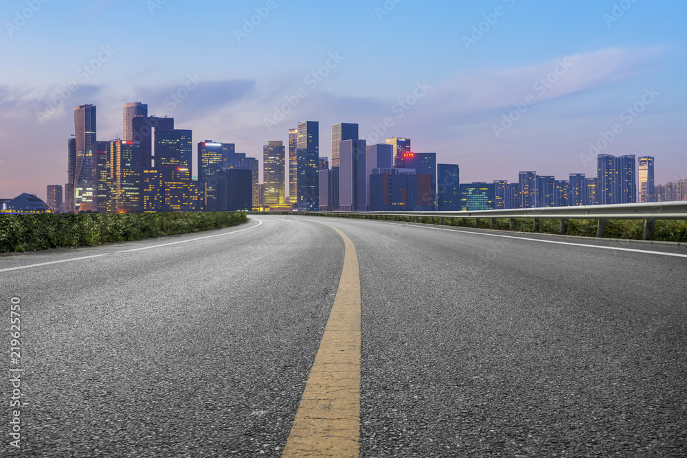 Urban road asphalt pavement and skyline of Hangzhou architectural landscape Urban road asphalt pavement and skyline of Hangzhou architectural landscape
