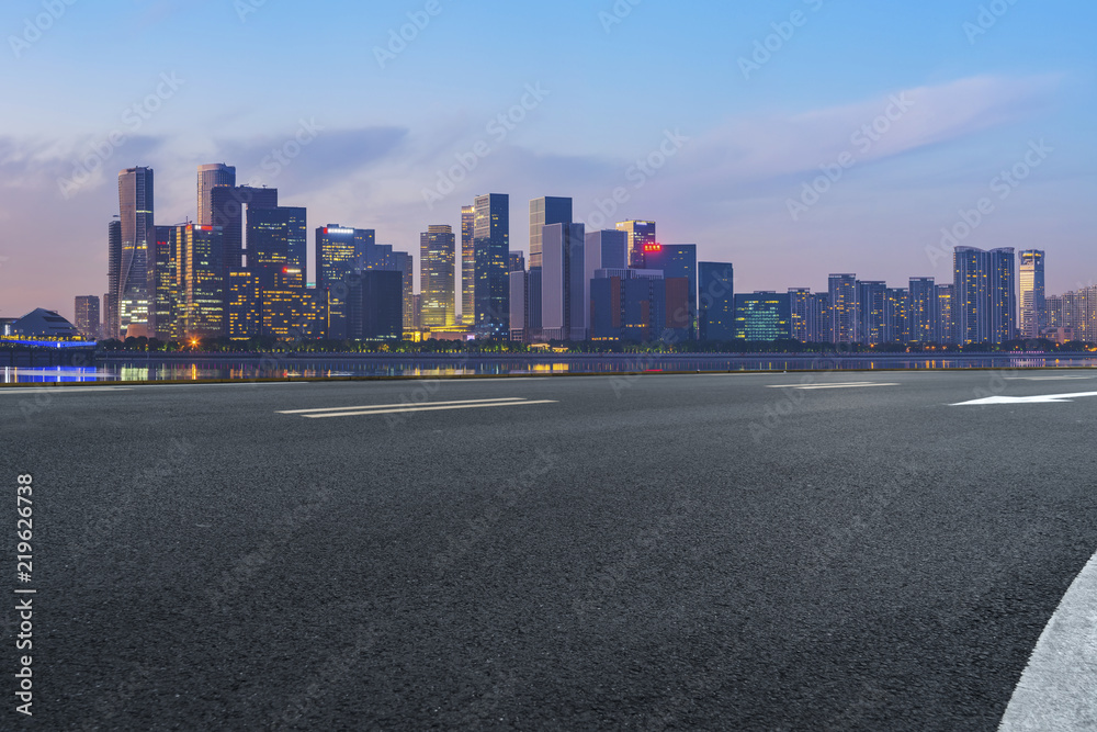 Urban road asphalt pavement and skyline of Hangzhou architectural landscape Urban road asphalt pavement and skyline of Hangzhou architectural landscape
