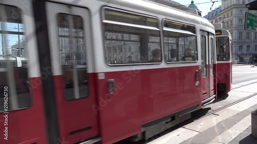 City tram is riding intersection in the center of capital of Austria, Vienna city