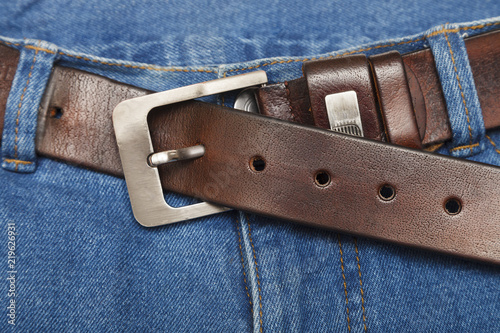 jeans with leather belt close-up