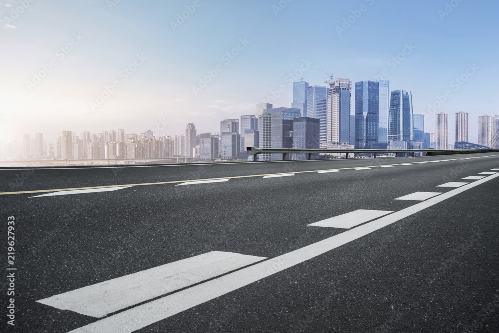 Fototapeta premium Road surface and skyline of Chongqing urban construction