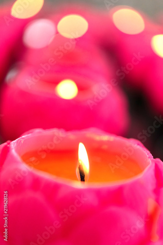 Flower candles burning at night.