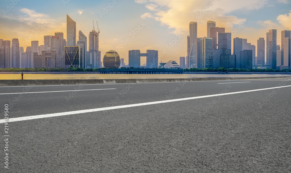 Urban road asphalt pavement and skyline of Hangzhou architectural landscape Urban road asphalt pavement and skyline of Hangzhou architectural landscape