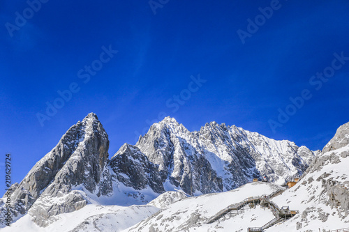 Looking up at the majestic and snowy mountain top, in Yulong Snow Mountain, Lijiang City, Yunnan Province, China