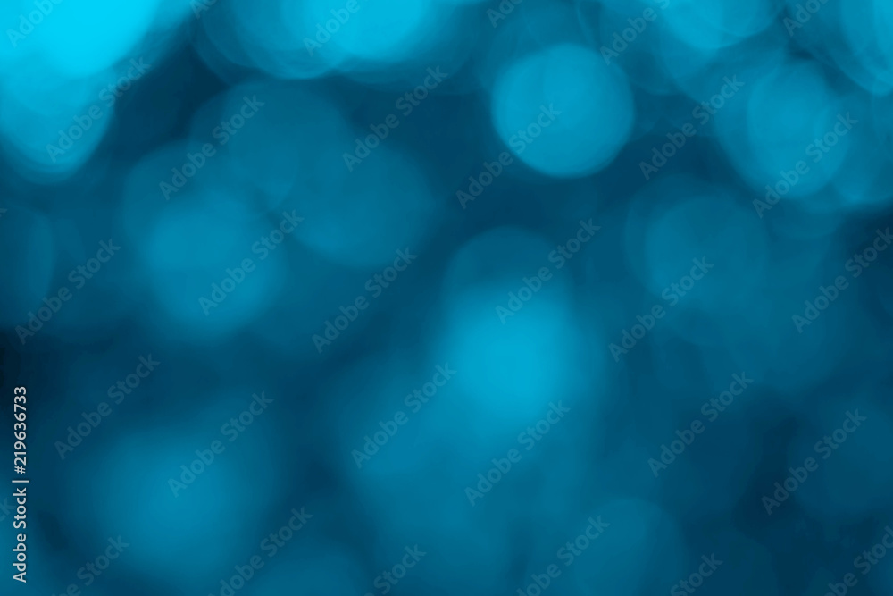 Abstract blue bokeh background.