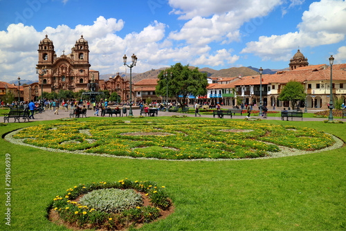 Plaza de Armas square with one of its famous landmark, church of the society of jesus, Cusco of Peru, South America 