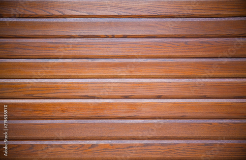Dark wooden background with new and regular panels