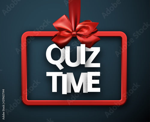 Quiz time blue sign with red satin bow.
