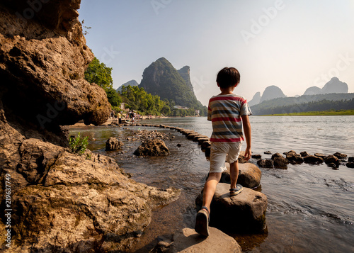 Stepping stone crossing on li river Yangshuo