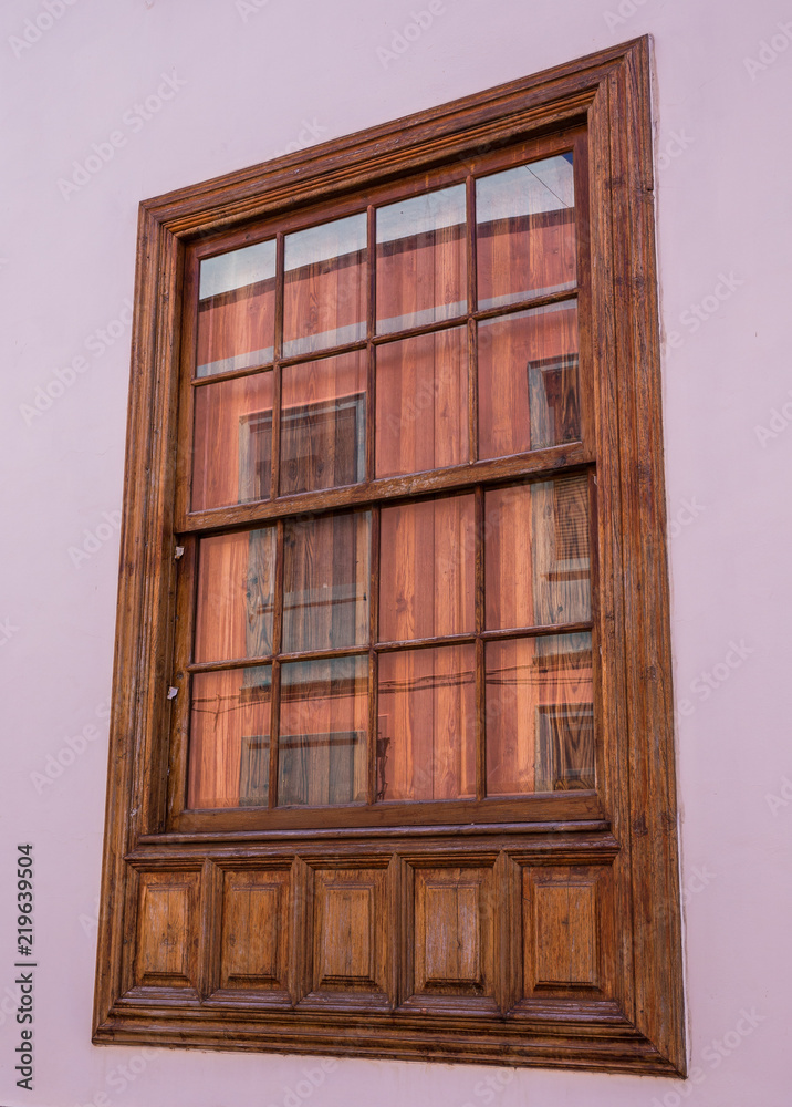 Window reflection in the old city center, San Cristobal de La Laguna, Santa Cruz de Tenerife, Canary Islands, Spain Window reflection in the old city center, San Cristobal de La Laguna, Santa Cruz de Tenerife, Canary Islands, Spain