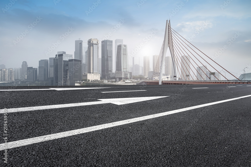 Fototapeta premium Road surface and skyline of Chongqing urban construction