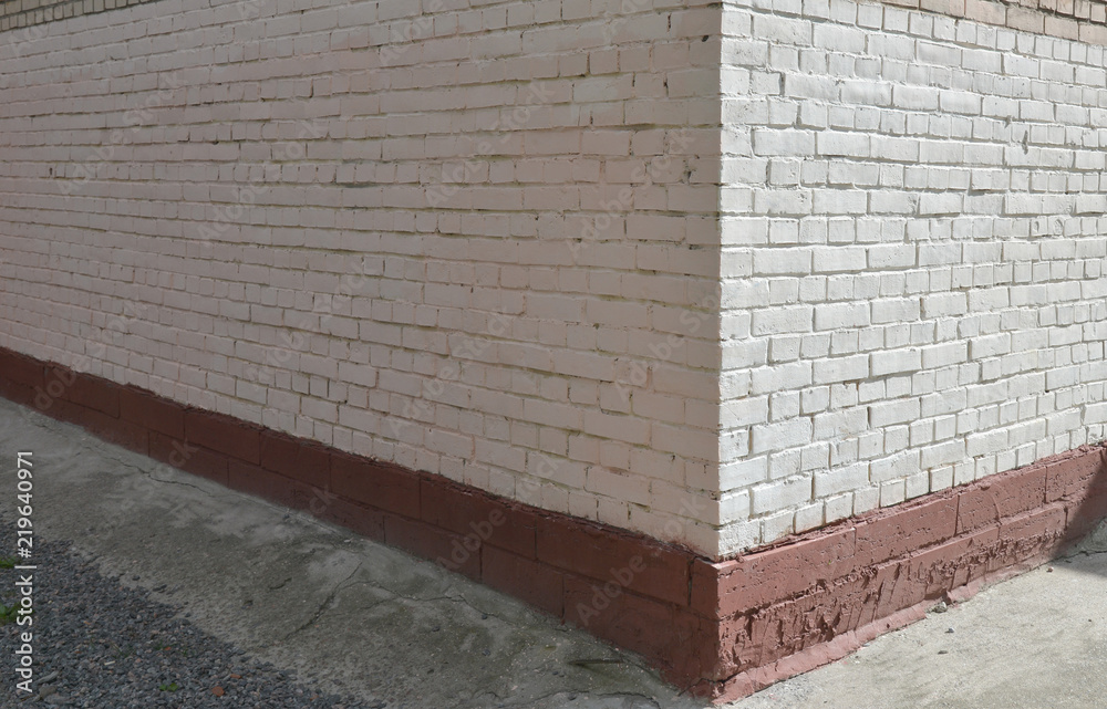 Fototapeta Narożnik domu, mur z cegły