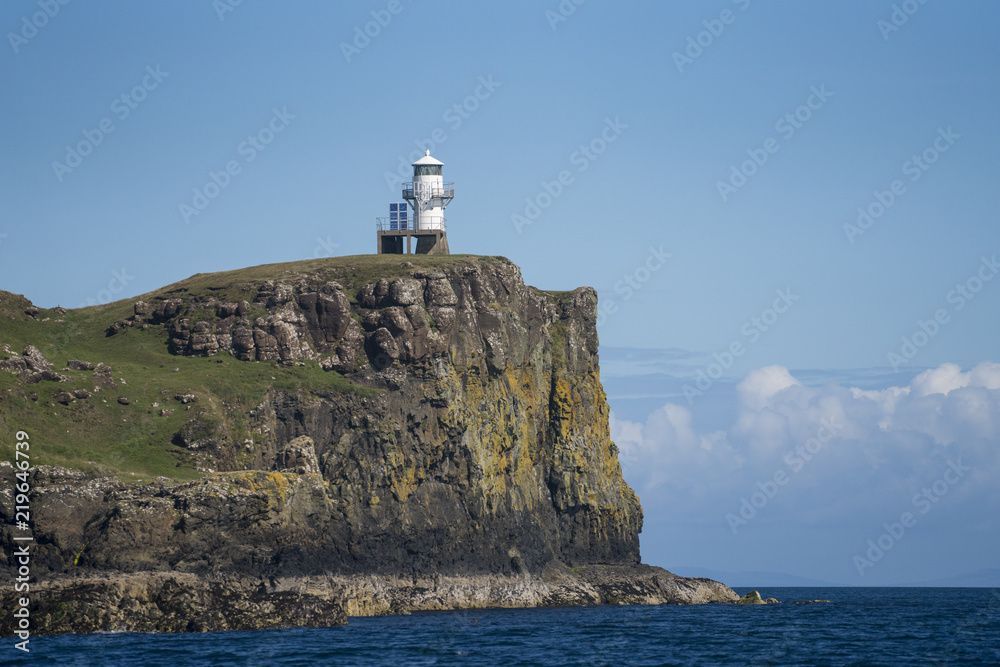 A small lighthouse on the island of Canna, the westernmost of the Small Isles archipelago, in the Scottish Inner Hebrides. A small lighthouse on the island of Canna, the westernmost of the Small Isles archipelago, in the Scottish Inner Hebrides.