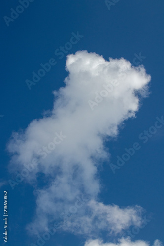 rising cloud on a perfect blue sky