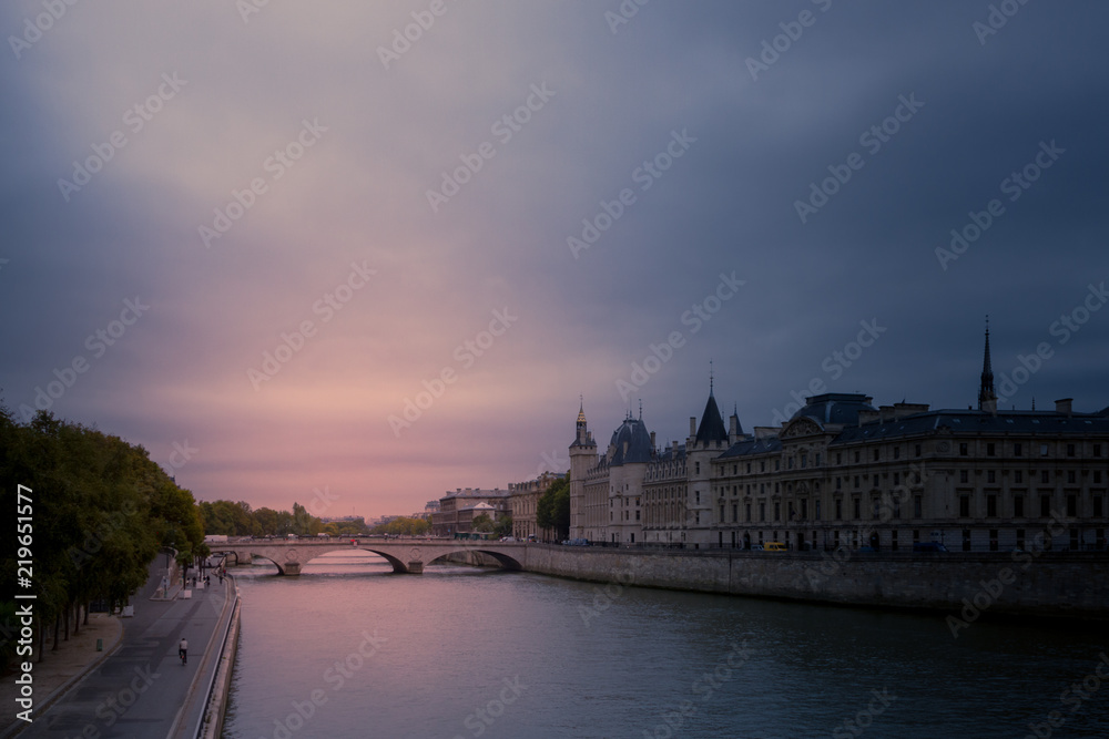 Sunset over the Pont Du Change and the Palais De La Cite in Paris , with the River Seine, shot in October 2017