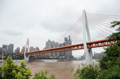 Chongqing, China, urban landscape, Yangtze River Bridge and high-rise buildings