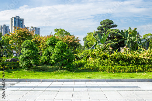 City park, clean unmanned square and lush woods and green meadows © 宗毅