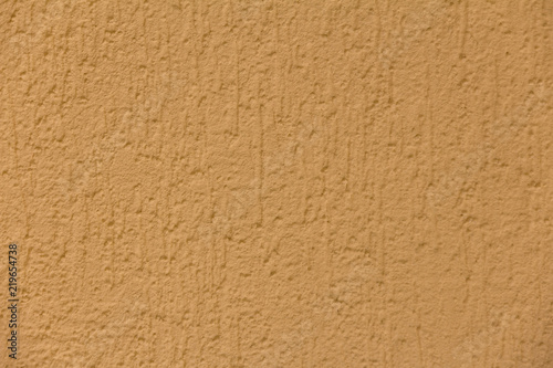 texture of yellow plaster