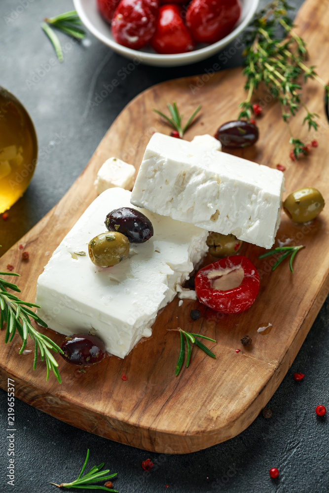 Greek cheese feta with thyme, rosemary, olives and stuffed red bell peppers Greek cheese feta with thyme, rosemary, olives and stuffed red bell peppers