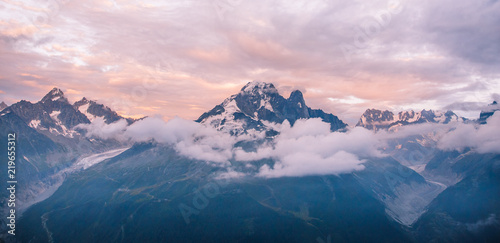 Cloudy Sunset over Iconic Mont-Blanc Mountains Range and Glaciers.