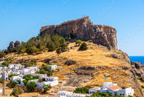 View of the Acropolis on the hill. Lindos village on Rhodes, island, Greece