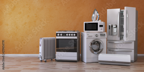 Set of household kitchen technics on yellow background. Set of appliance in the new appartments. E-commerce online internet store and delivering of appliances concept. photo