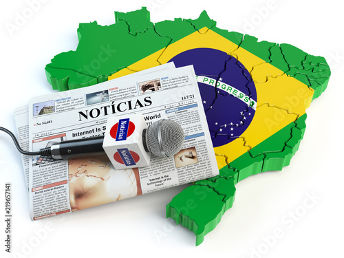 Brazilian news, press and  journalism concept. Microphone and newspaper with headline 