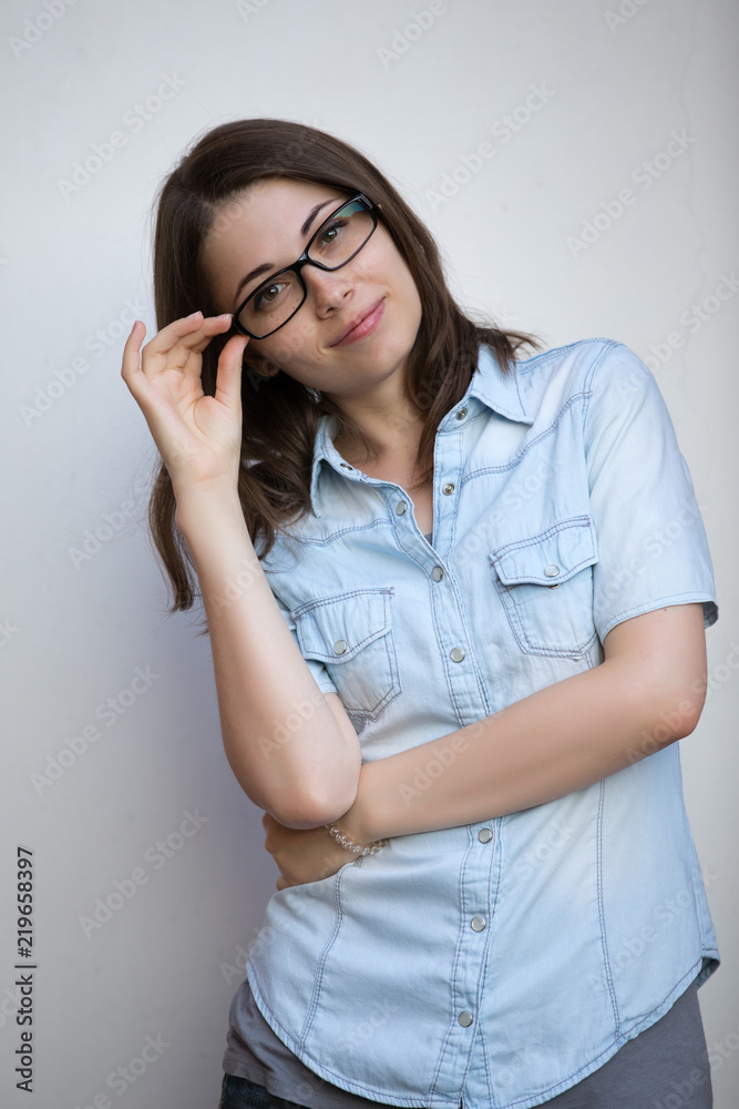 Eyeglasses for good vision, young woman on white background, medical concept Eyeglasses for good vision, young woman on white background, medical concept