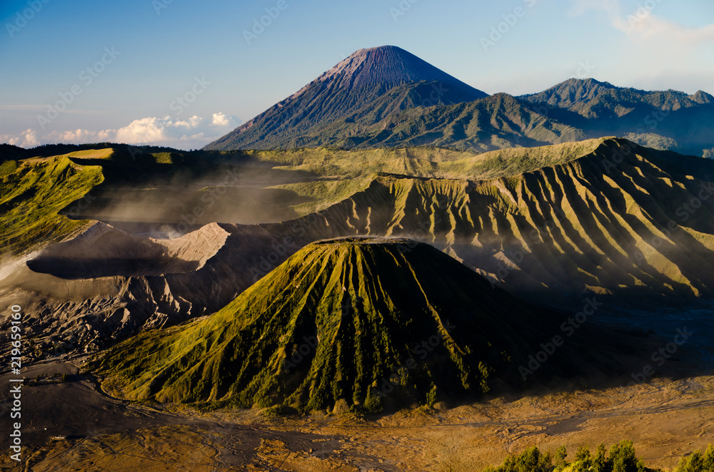 Scenic view of an active volcanoes and a caldera during sunrise - Jawa, Indonesia
