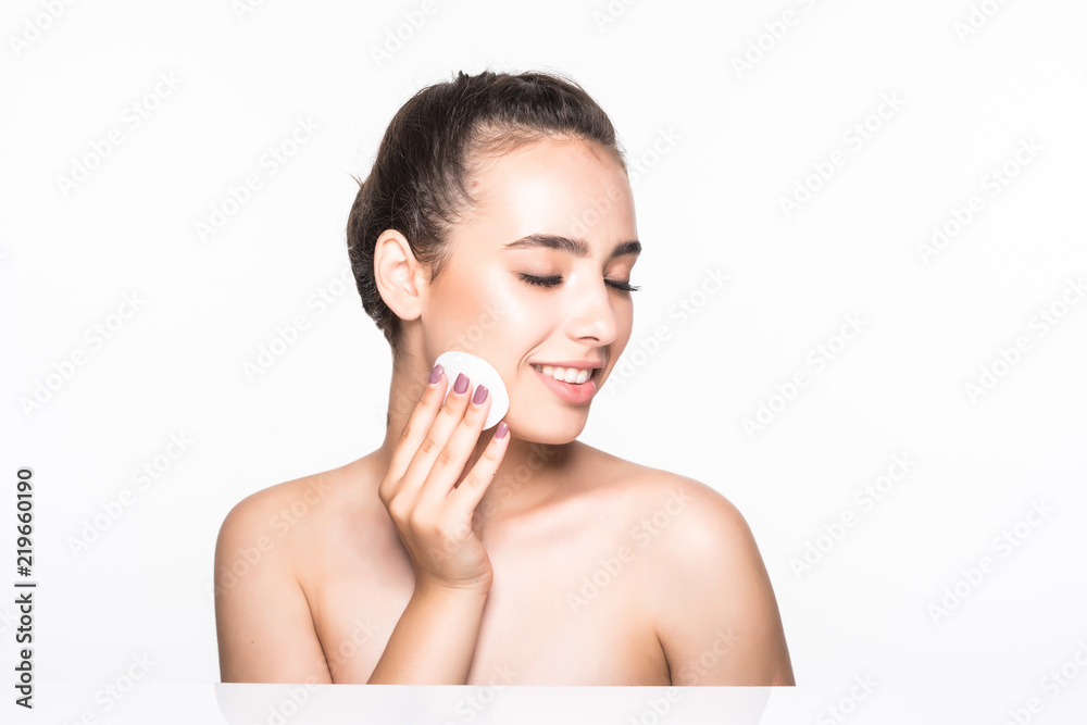 Young woman cares for face skin relaxation, leisure, neck, innocence, bright, serene, sexuality, Woman using cotton pad