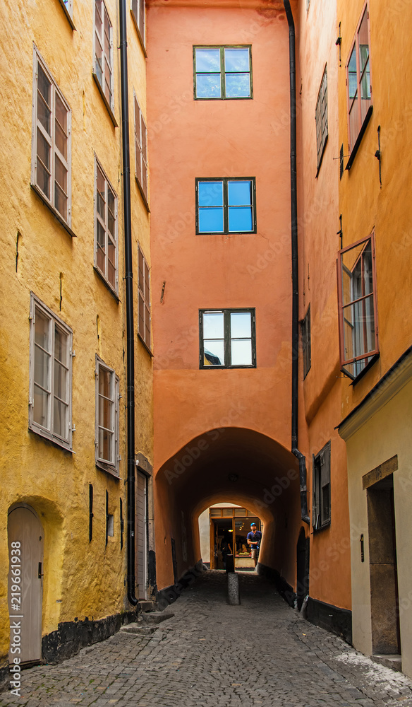 Stockholm old narrow cobblestone street and passage in the historical city center gamla stan. Sweden.