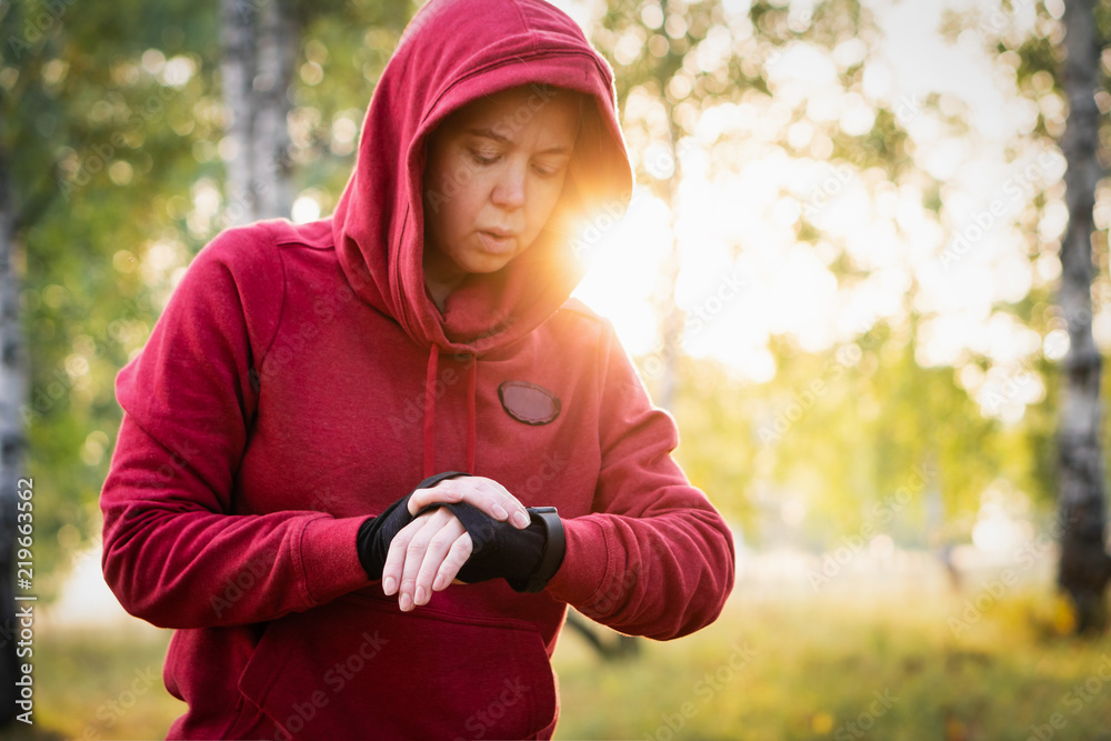 Watch for sports with smartwatch. Jogging training for marathon. Watch for sports with smartwatch. Jogging training for marathon.