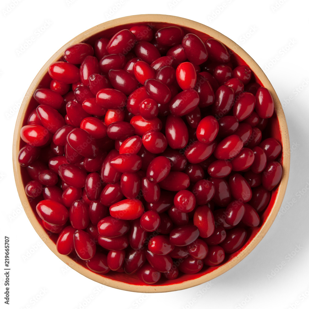 A bowl of a ripe dogwood on white. Top view